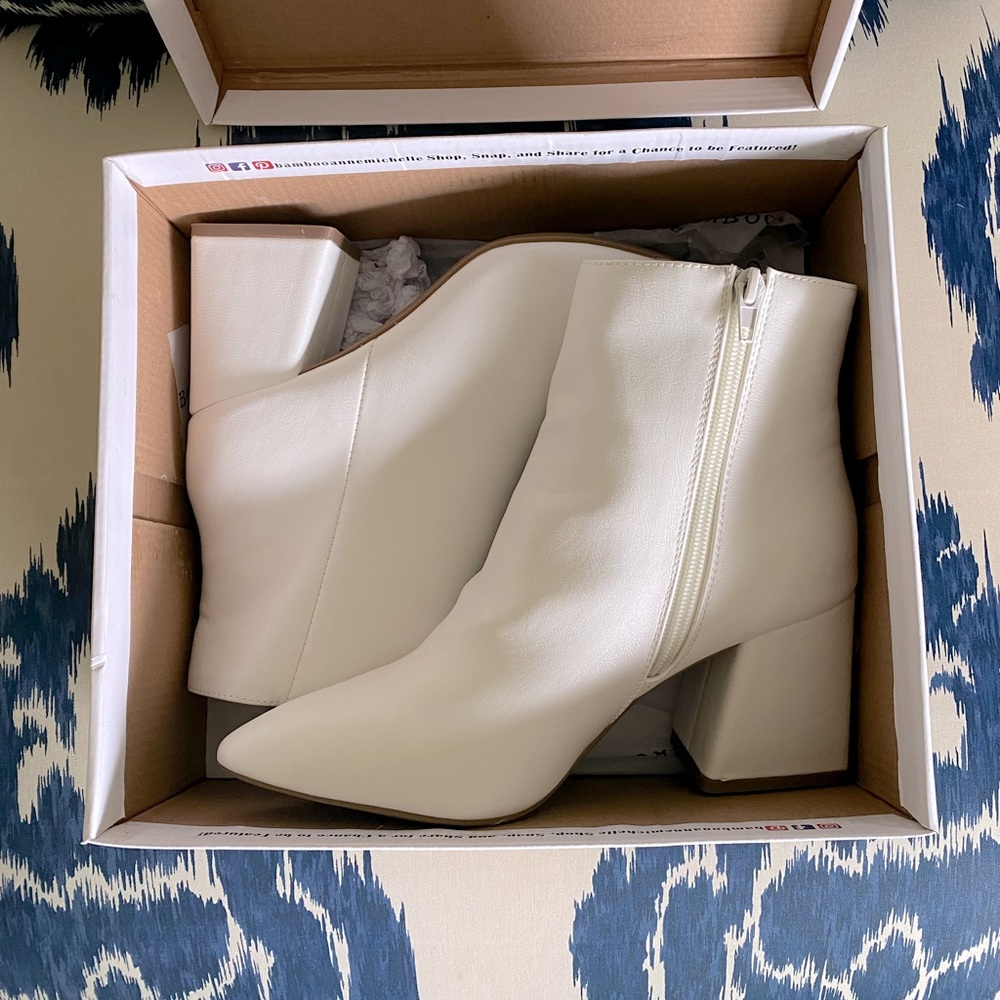 Brand New Never worn. Block heel white booties.